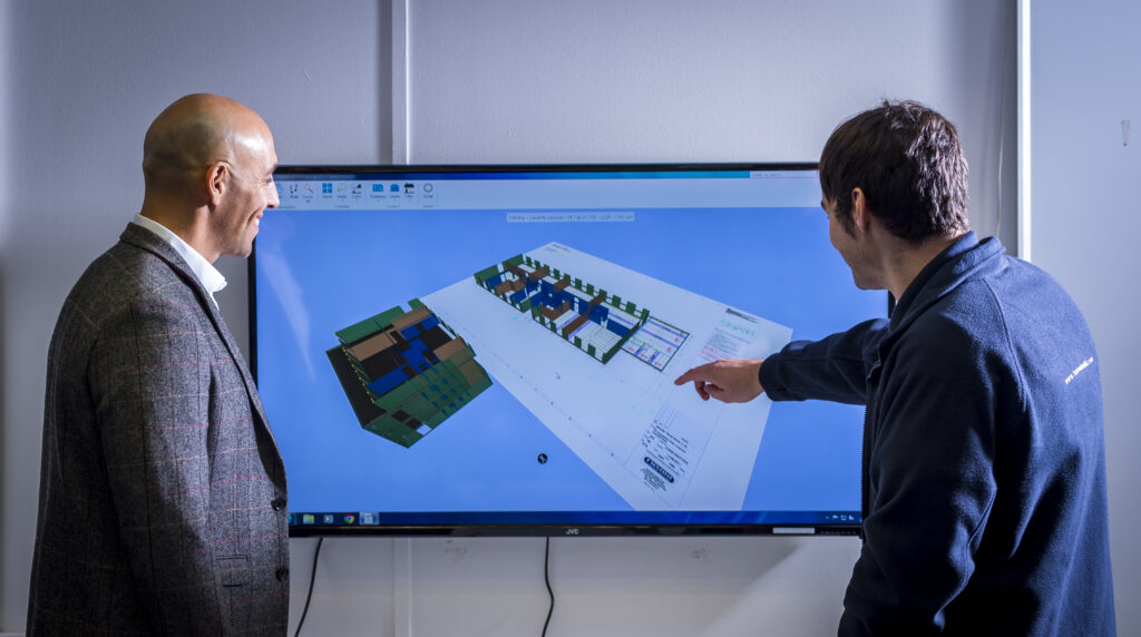People using Dalux FM BIM & Documentation feature on big screen